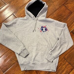 Champion Men’s M Gray Hoodie with Blue and Red paint splatter Logo